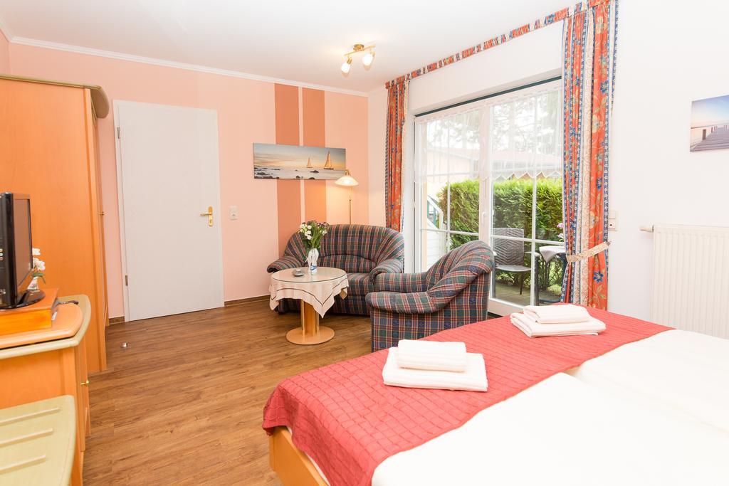 Hotel Garni Am Deich Zingst Habitación foto