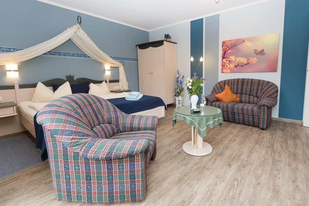 Hotel Garni Am Deich Zingst Habitación foto