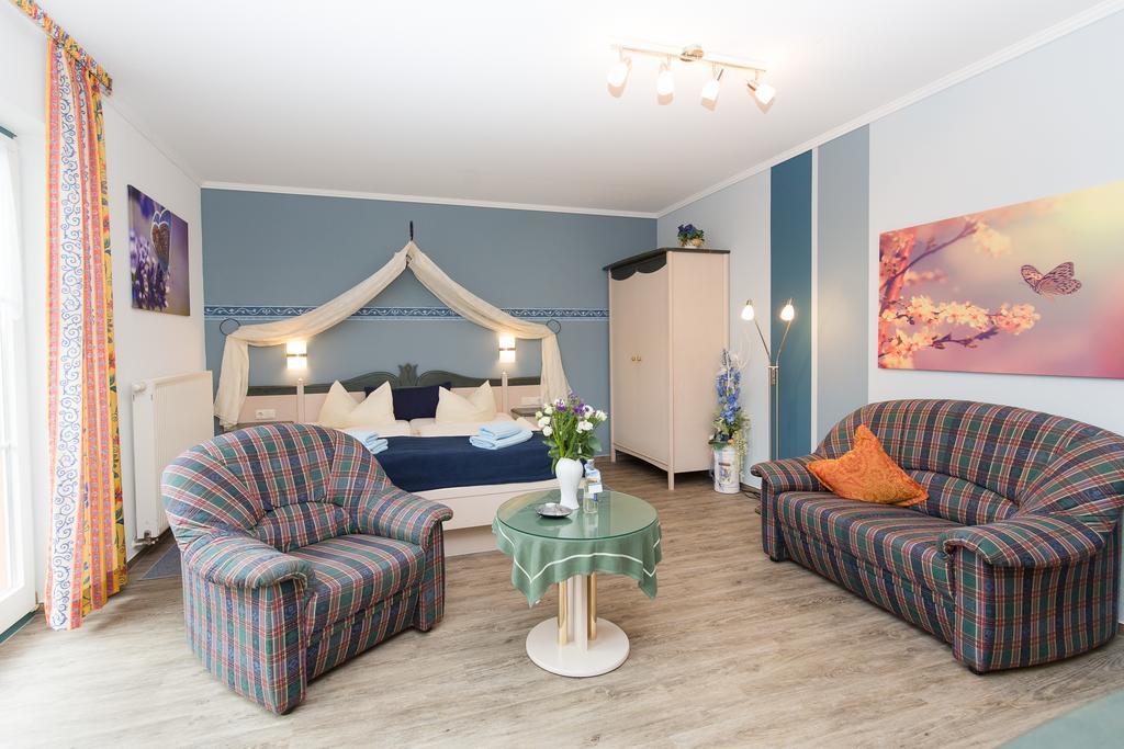 Hotel Garni Am Deich Zingst Habitación foto