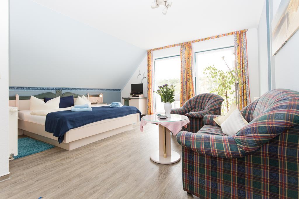 Hotel Garni Am Deich Zingst Habitación foto